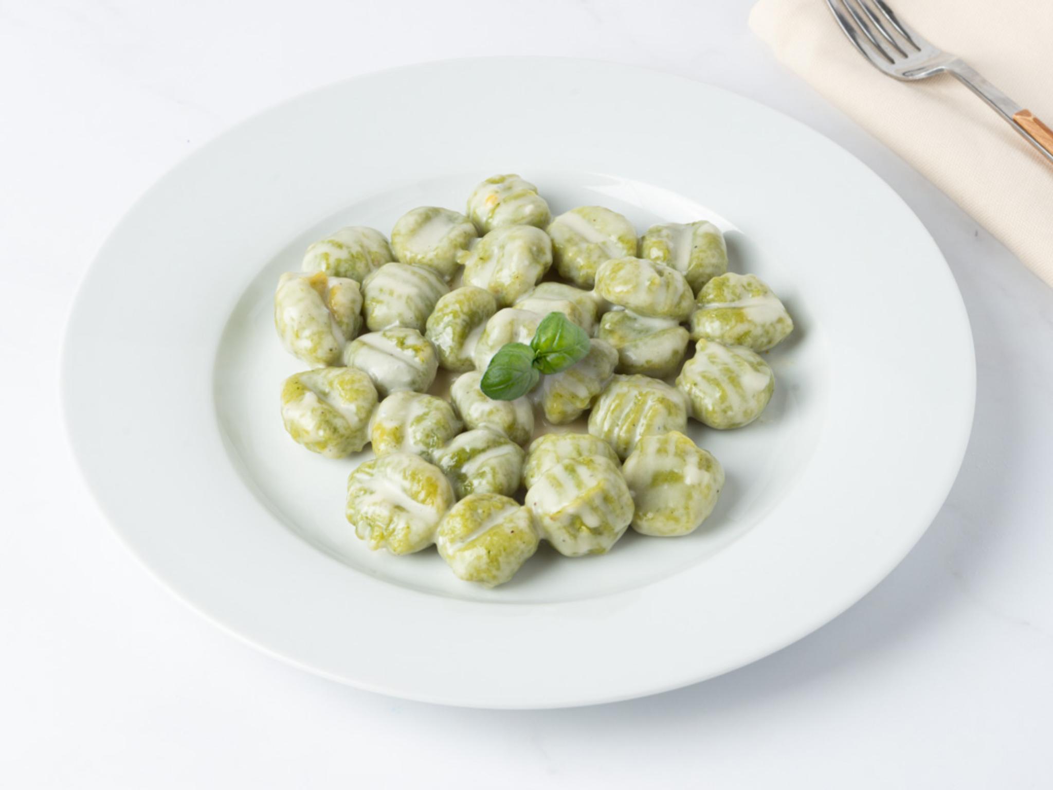 Gnocchi agli spinaci con sugo ai formaggi