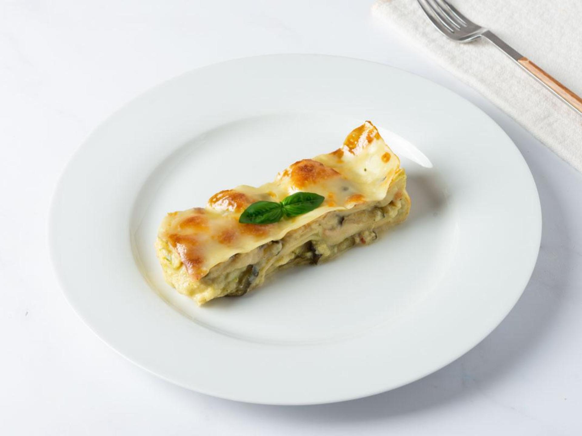 Lasagne con zucchine, basilico e scamorza affumicata
