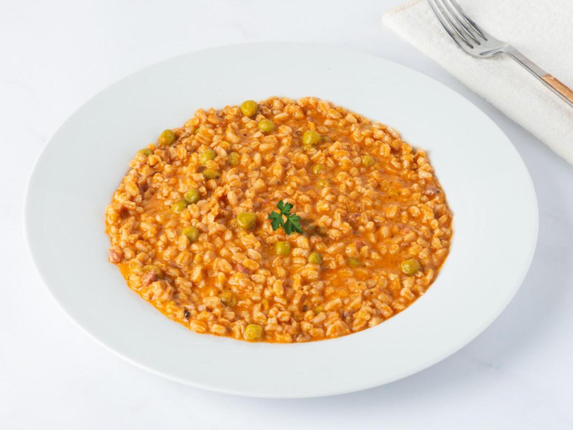 Farrotto con piselli e prosciutto