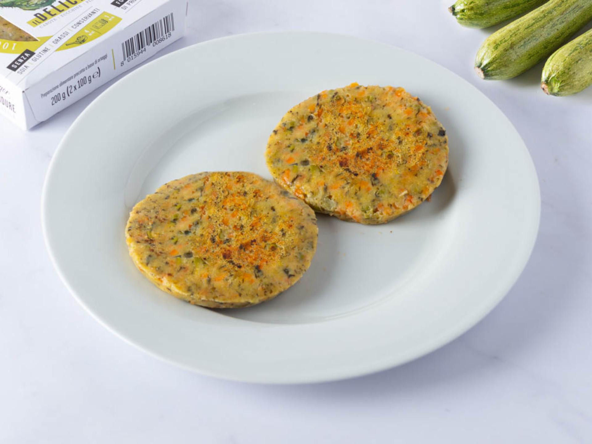 Burger con spinaci, carote, piselli e zucchine