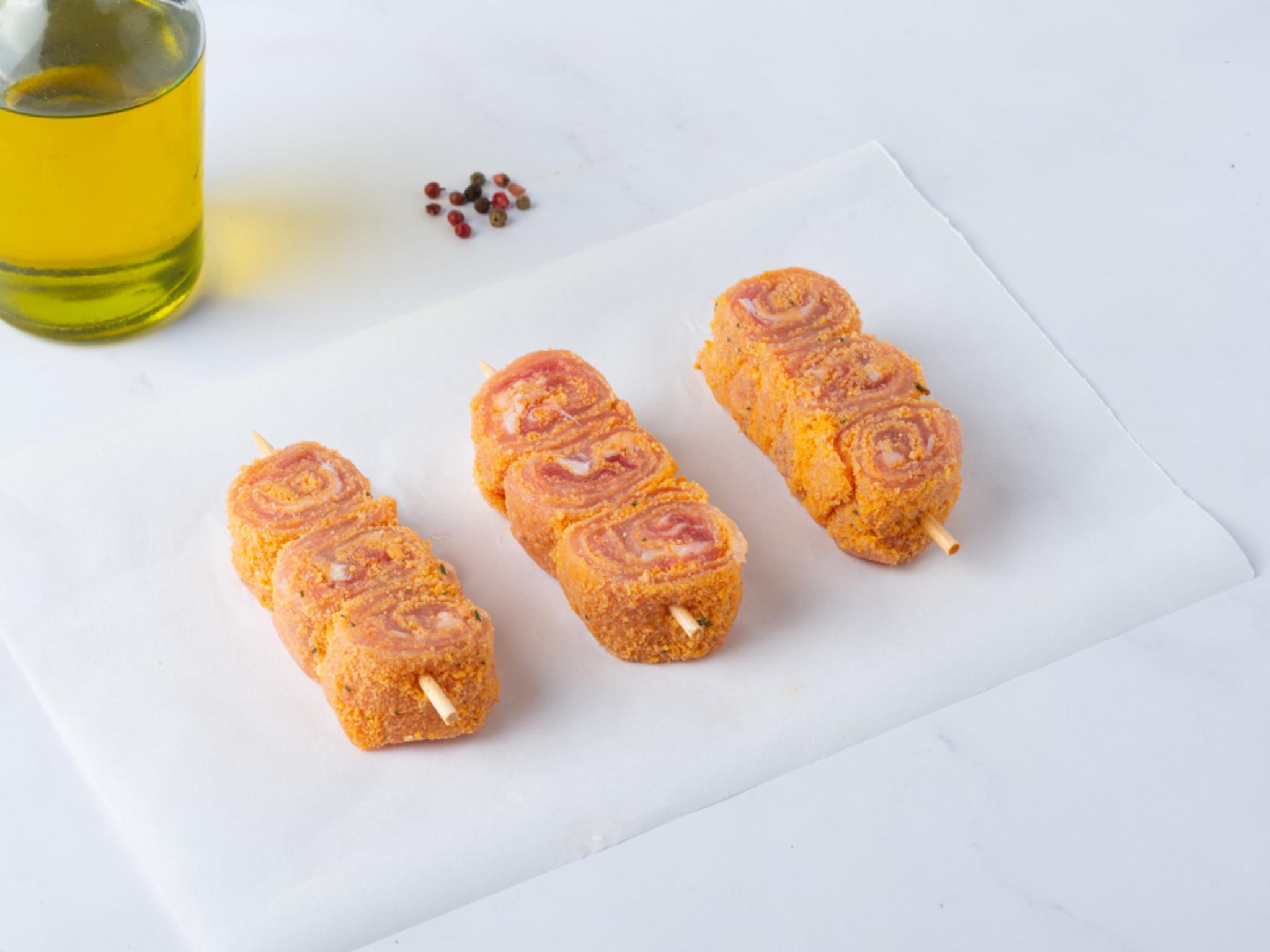 Spiedini di suino panati alla paprika