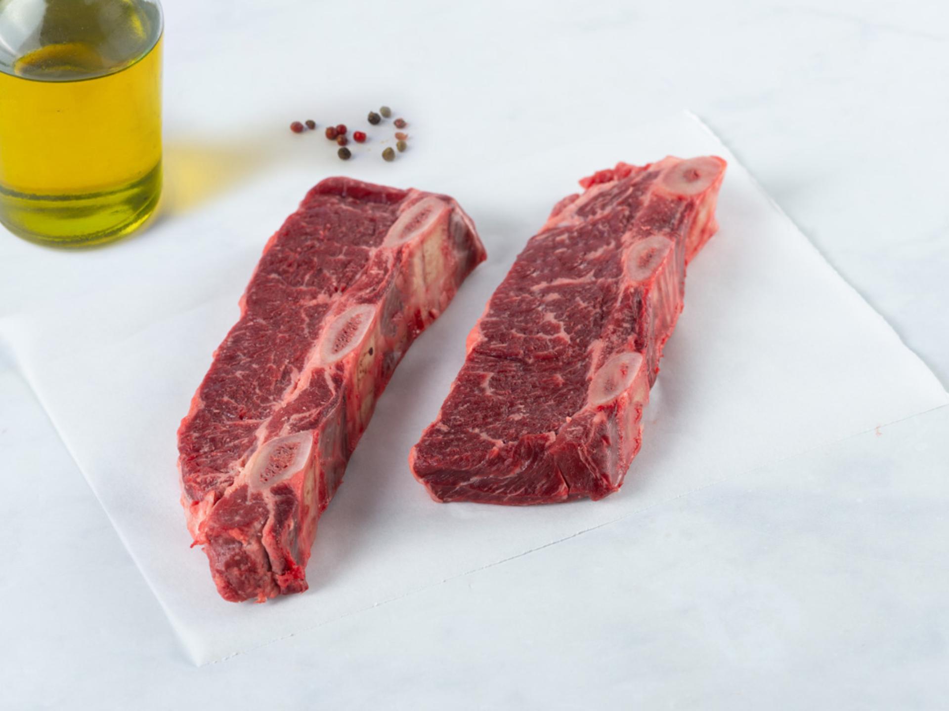 Costine da asado di Grigio Alpina smalgiada
