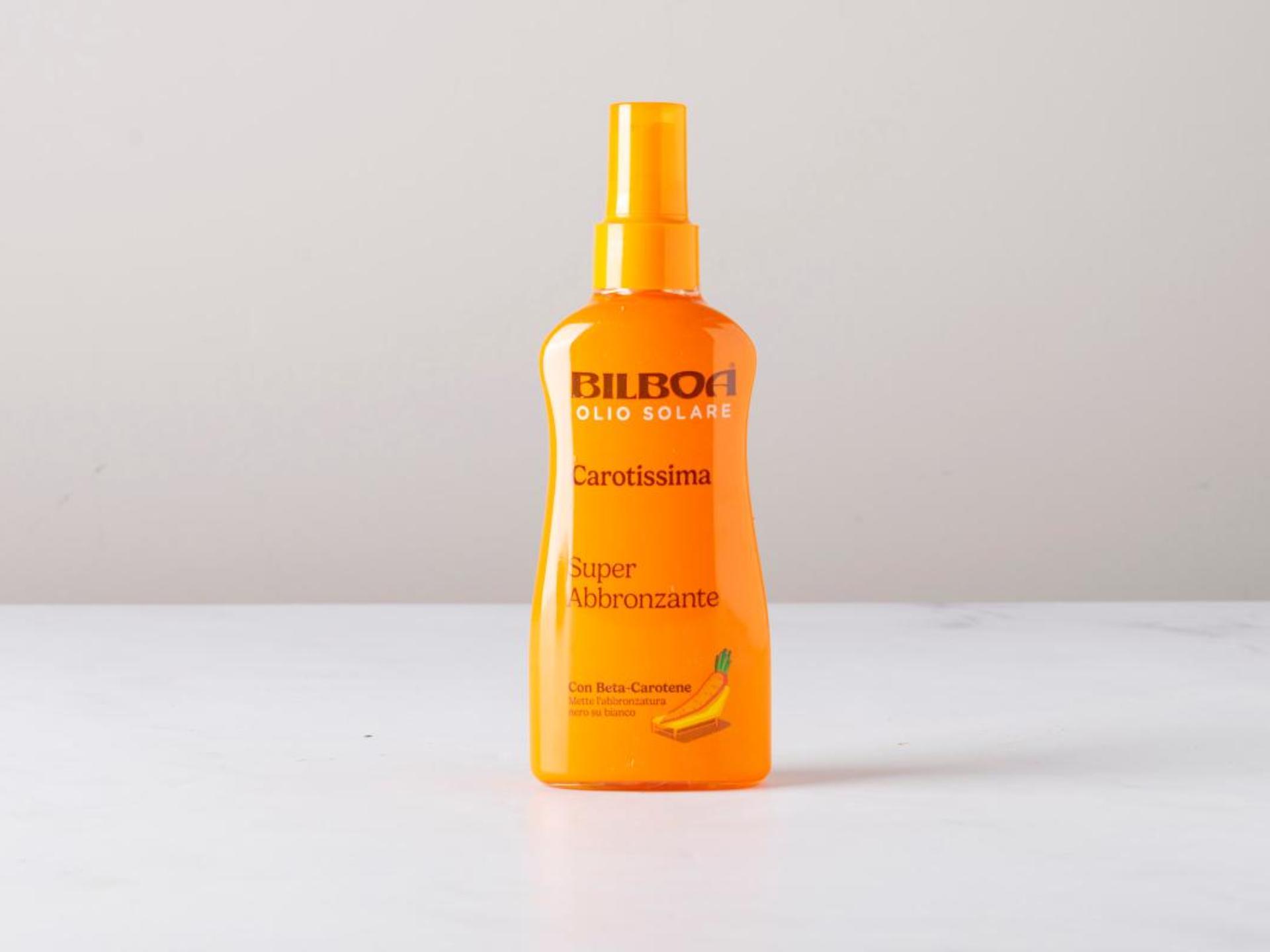 Olio abbronzante spray con beta-carotene